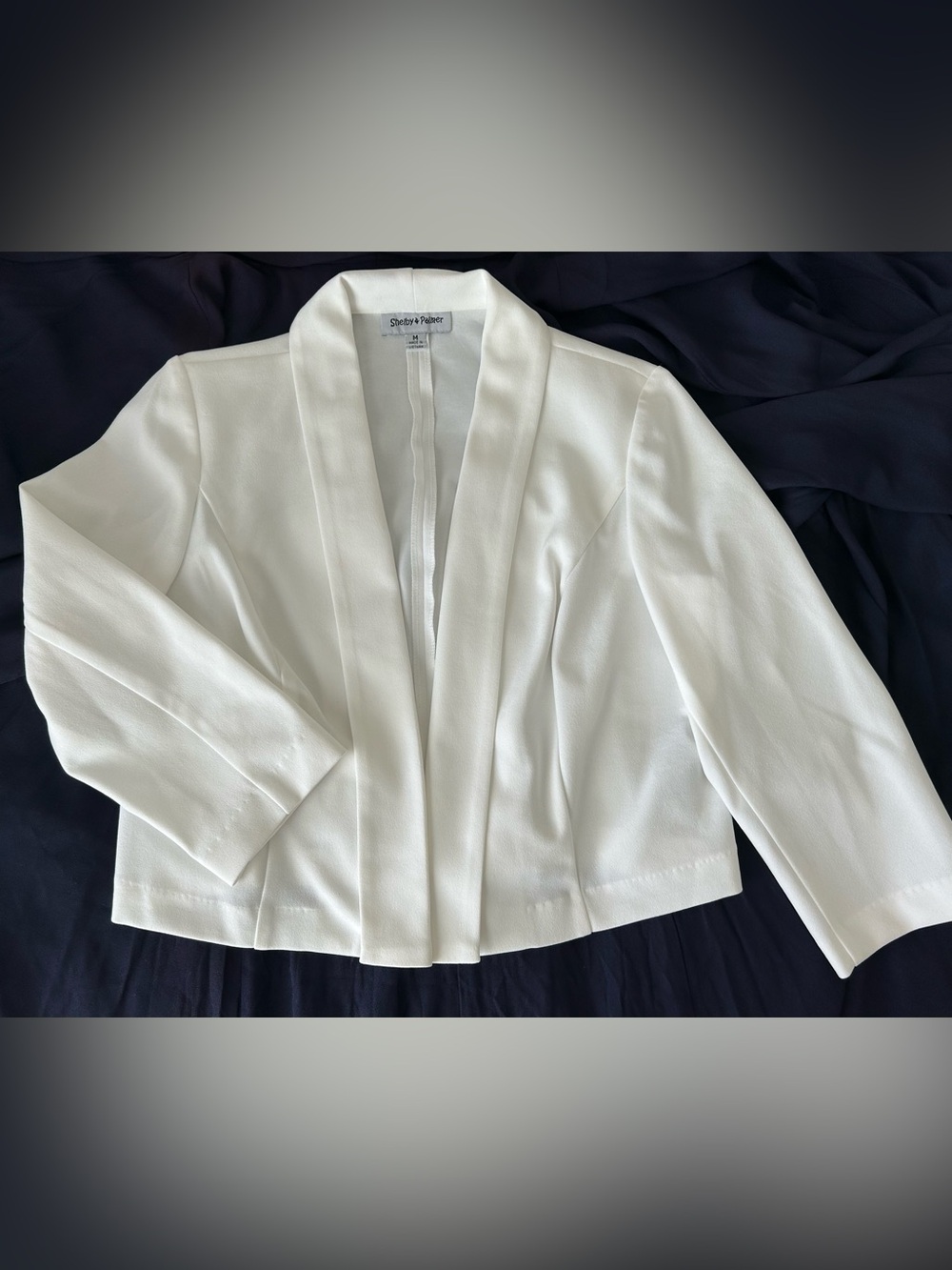 Shelby & Palmer Collection Cream Open-Front Cropped Blazer